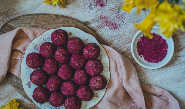 a featured image for beetroot powder covered energy bliss balls