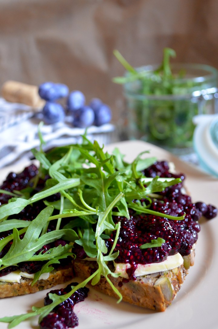 healthy snack idea toast with blueberry lemon chia jam with butter and arugula