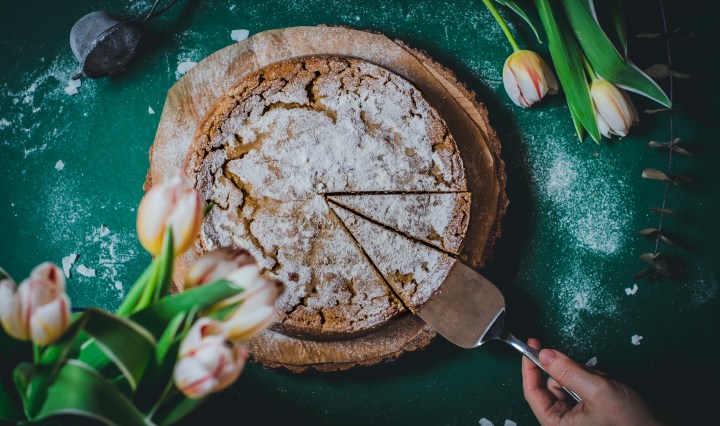 getting two slices of this vegan coconut dream millet cheesecake