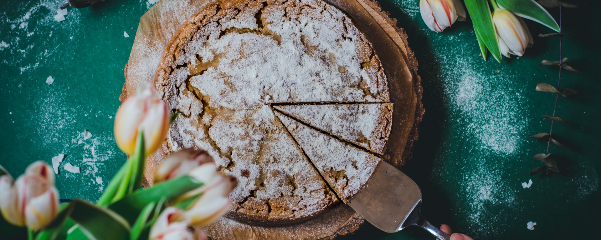 getting two slices of this vegan coconut dream millet cheesecake